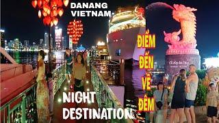 Discover the beauty of the Carp Transforming into Dragon Statue and the Love Bridge at night