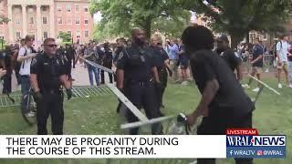 Officer slaps at protester's megaphone during UNC-Chapel Hill protest