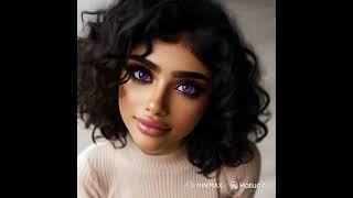 Curly beauty looks up at u sweetly