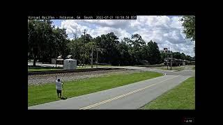 CSX 1, 2, and 3 pass Folkston GA with a railfanner