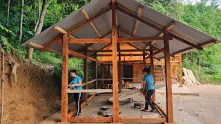 Build a wooden kitchen, using wooden bars as a frame and clearing the grass in the garden