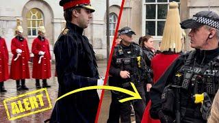 Armed Police with MP5 Firearms stand on High Alert during Torrential Downpour at Horse Guards