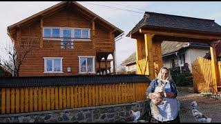 Romanian woman cooks traditional food in an ancient mountain village.