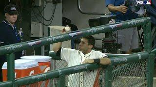 CLE@DET: Kinsler barehands a foul ball in the dugout