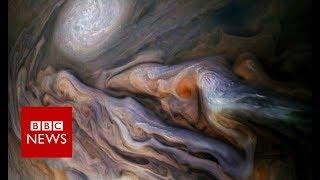 Dive over Jupiter's cloud-tops with Nasa's Juno craft - BBC News