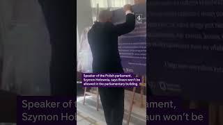 Far-right Polish MP banned from parliament after destroying LGBT exhibition