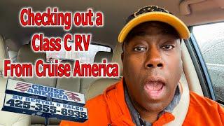 checking out an RV to buy from Cruise America