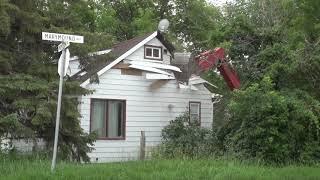 New infill construction project in Winnipeg - Demolishing an old building.