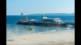 Multi-agency rescue operation and beach evacuated at Bournemouth Pier after a major incident