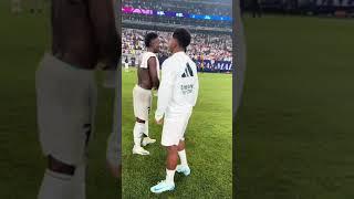 Vini and Rodrygo with Raphinha after the match 