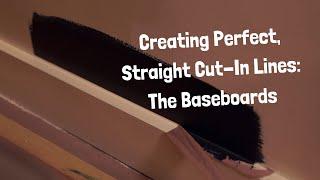 Creating clean, straight lines: taping and sealing the tape with paint for the baseboards