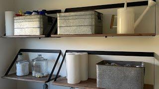 Pottery Barn laundry room shelves.... could be better but they look great!