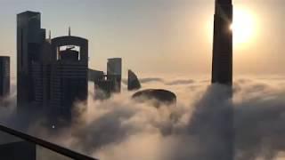 Burj Khalifa morning view above the clouds in dubai