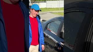 Quick-Thinking Stranger Shields Dog from Car Wash Spray