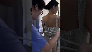 trying on luxury wedding dress tie back with lace up heavy beading stone wedding dress shopping