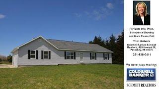 10303 Cecil Bay, Carp Lake, MI Presented by Trish Hartwick.