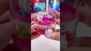 Teeny tiny claw machine! Are those mini Dino’s?! #clawmachine #asmr #vending #shorts