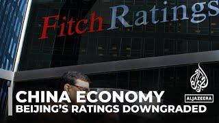 Ratings agency Fitch lowers China’s sovereign credit outlook to negative