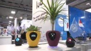 Smart plant pots that smile, squint and cry