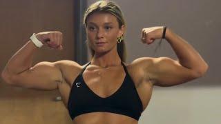 Teen muscle girl flexing biceps