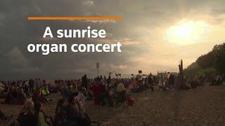 Latvian beach greets sunrise with organ concert