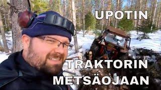 Upotin traktorin metsäojaan