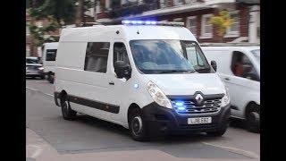 Unmarked Mental Health Ambulance responding urgently through heavy traffic