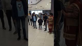 My sweet daughter in mall of Amritsar. Playing game.