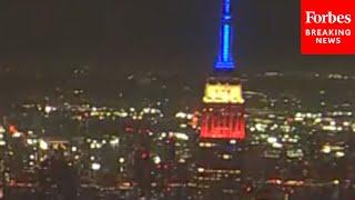 The Empire State Building Is Lit In Red, White, And Blue In Honor Of Late President Jimmy Carter