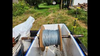 THE FARMHOUSE. Running electric fence wire. Finishing up the fence posts. Picking peas. Cooking.