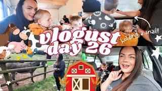 Vlogust Day 26 - Fun at Floralands Farm Park - holding a snail 