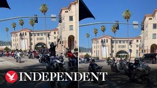 Stunt performers ride motorbikes through LA in solidarity with strikes