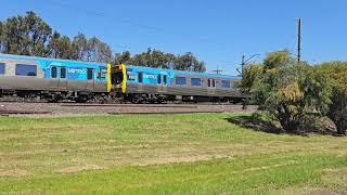 Upfield train passing through royal Park just before royal Park station | 4K