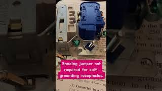 Bonding jumper is not required for self-grounding receptacles.