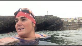 Swimming at Bude Sea Pool, Cornwall, UK.