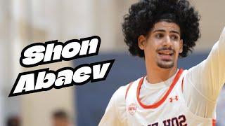 Shon Abaev  punching top notch buckets  at Tip Off Classic