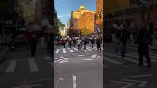 Peaceful march in Manhattan New York University Place, Thanksgiving weekend.