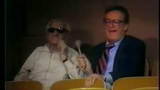 Steve Allen talks to a man sleeping in audience - 1970's