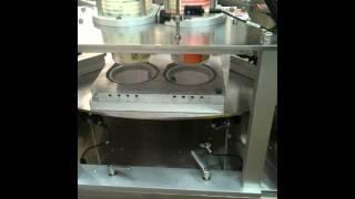 Rotary tub filling and sealing