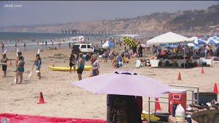 Large crowds fill San Diego County beaches as holiday weekend begins