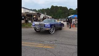 Donk with heavy motor doing a burnout on 26s #burnout #donks #carshow