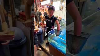 Live Squid "Shots" In Bangkok Market