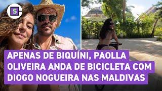 Paolla Oliveira anda de bicicleta com Diogo Nogueira apenas de biquíni nas Maldivas