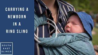 Carrying a newborn in a ring sling