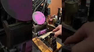Preparing and inking the 3x5 Kelsey Excelsior press with pink rubber base ink