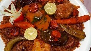 thiébou kethiakh bou khonk  la cuisine séné guinéen ( cuisine sénégalais ) riz au poison fumé rouge