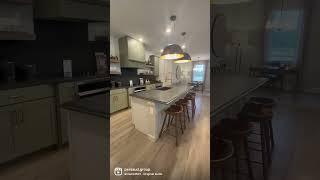 How do you like this Green Cabinets and Black Countertop kitchen combination? #floridahomesforsale