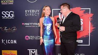 Stefaniya Makarova on the red carpet at Art Hearts Fashion Week wearing a 'beautiful dress'