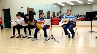 Caleb's 1st guitar ensemble "Dark Eyes" 03 24 2013