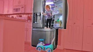 TODDLER SNEAKS IN FRIDGE (caught on camera)